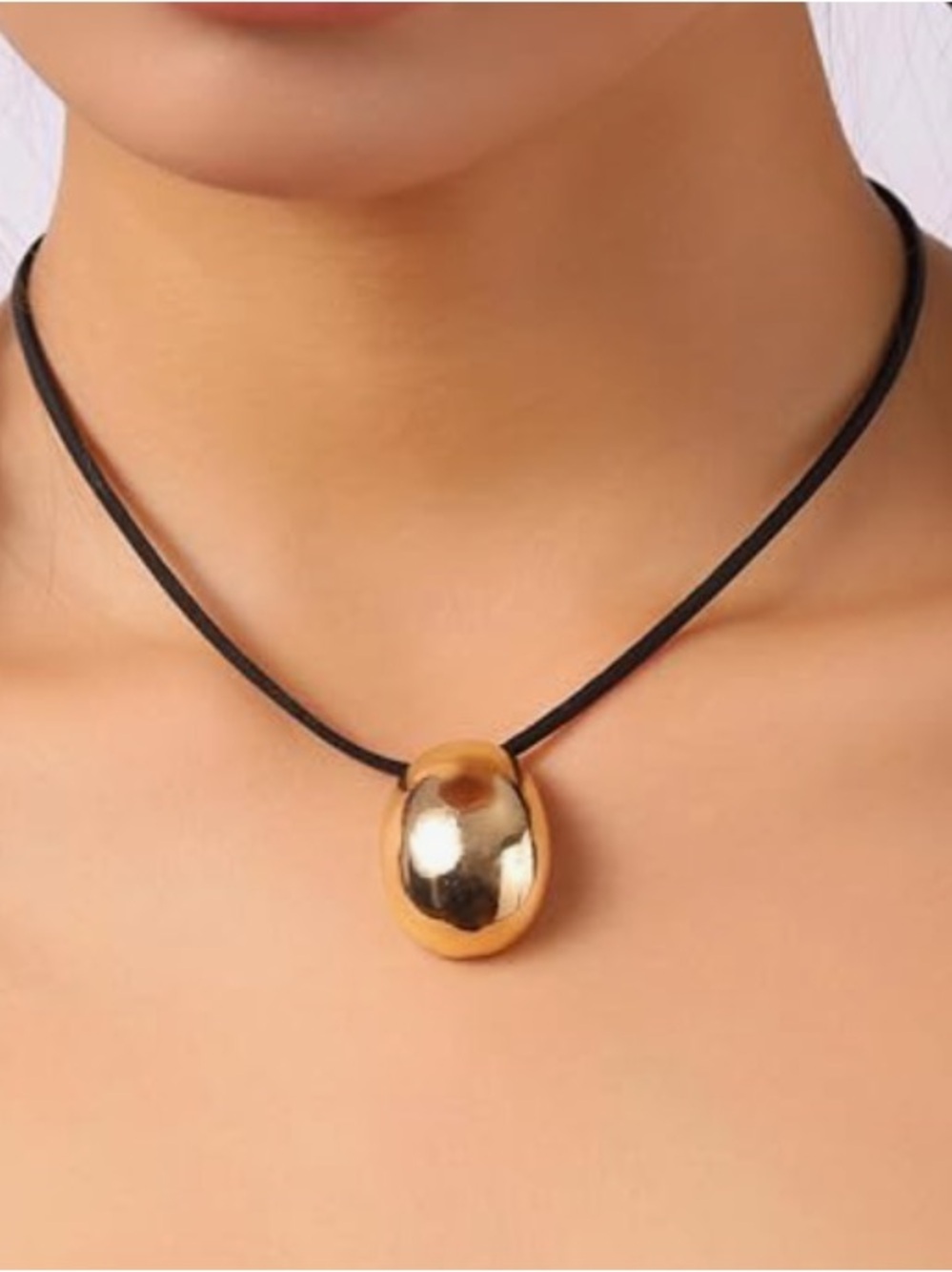Gold Oval Bead Necklace with Black Cord